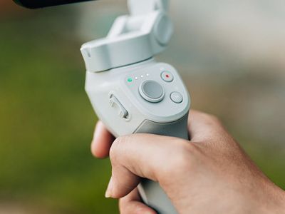 Close-up on an athlete's hands gripping the floor for stability.